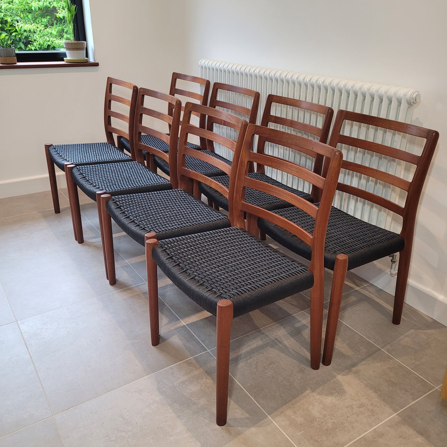 Set of 8 Niels Otto Møller #85 Teak chairs black paper cord seat