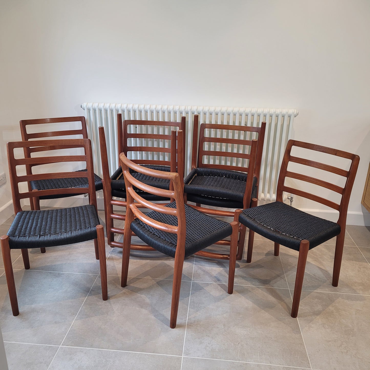 Set of 8 Niels Otto Møller #85 Teak chairs black paper cord seat