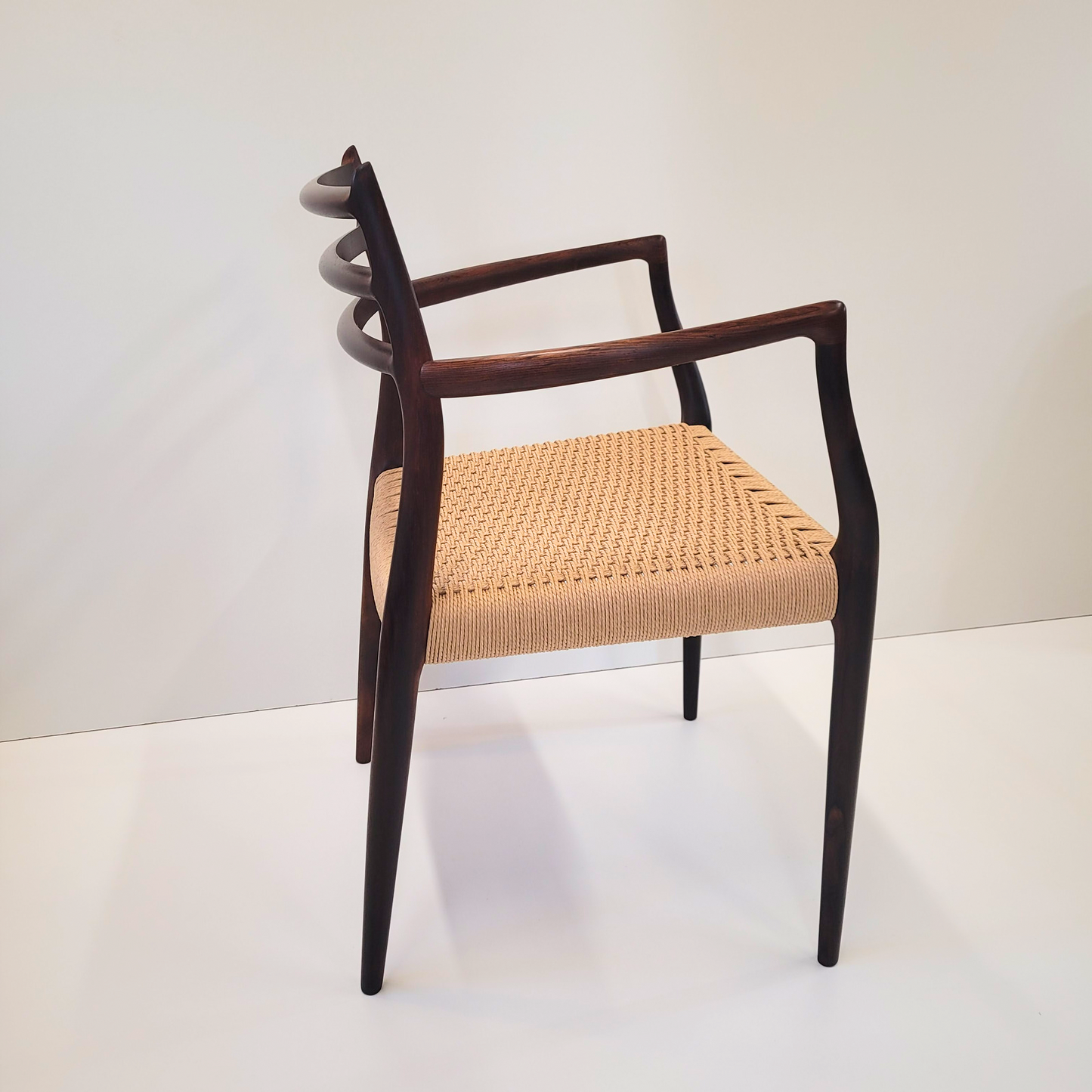 Niels Otto Møller #62 Rosewood carver dining chair