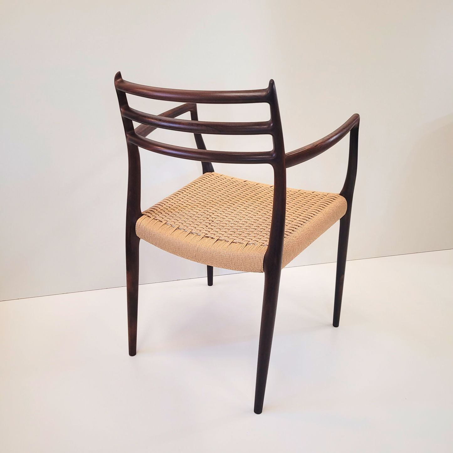 Niels Otto Møller #62 Rosewood carver dining chair