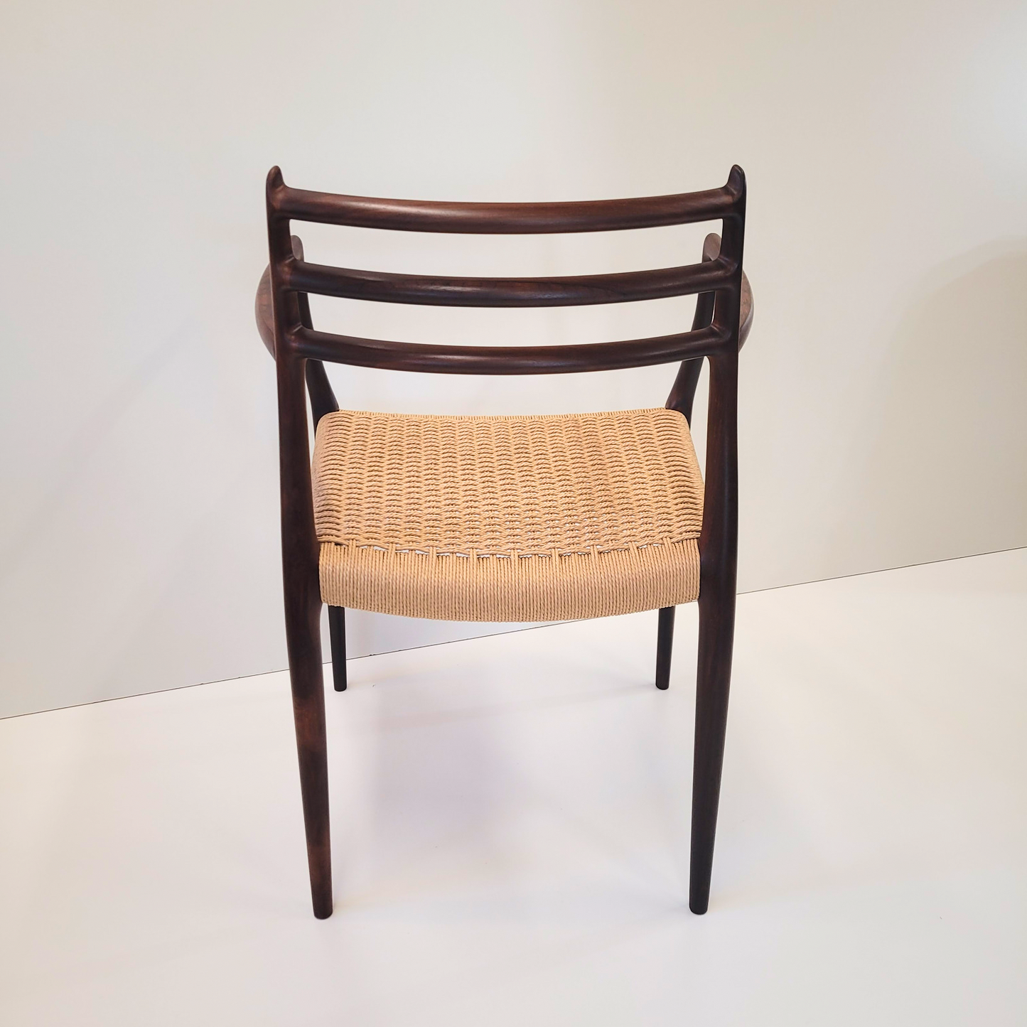 Niels Otto Møller #62 Rosewood carver dining chair