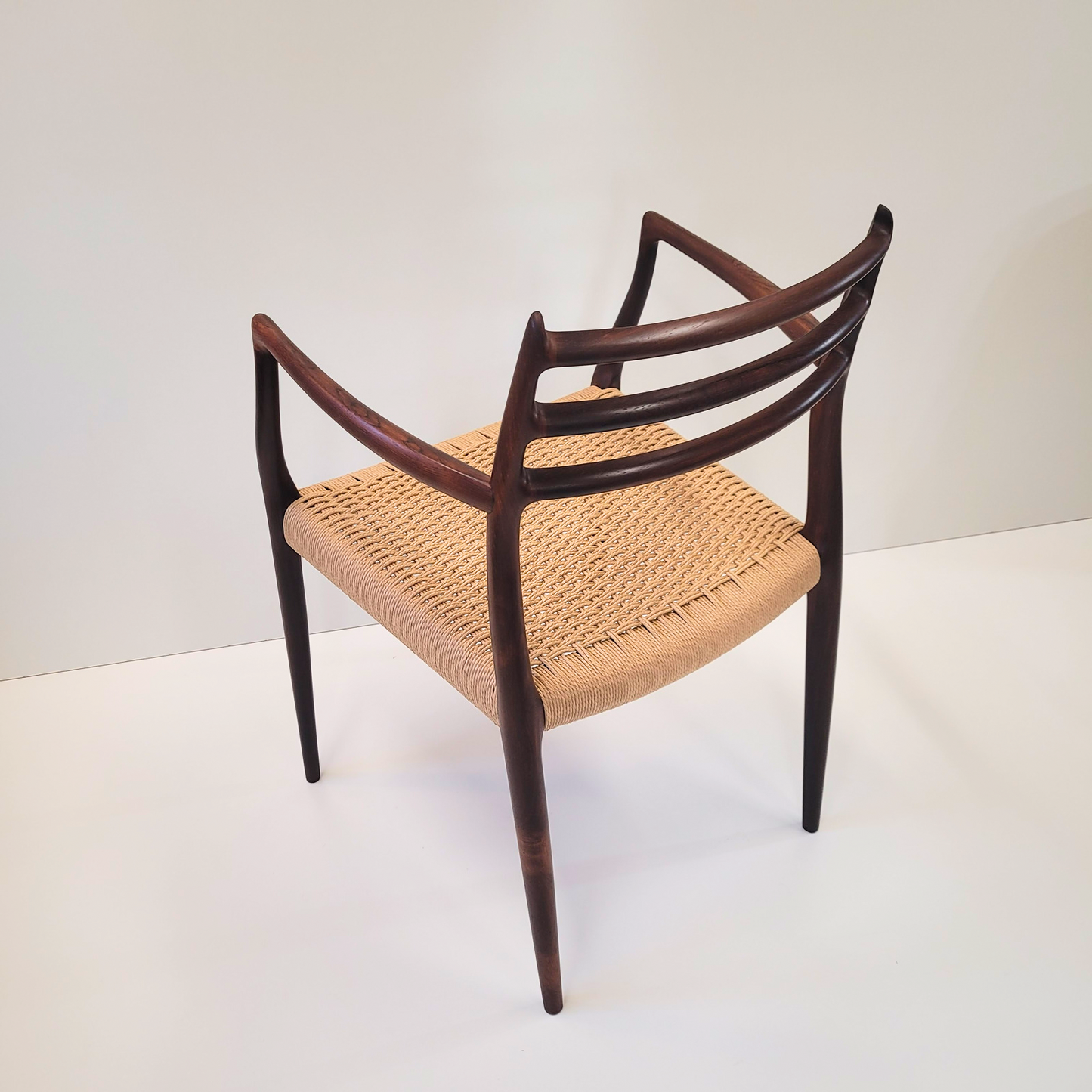 Niels Otto Møller #62 Rosewood carver dining chair