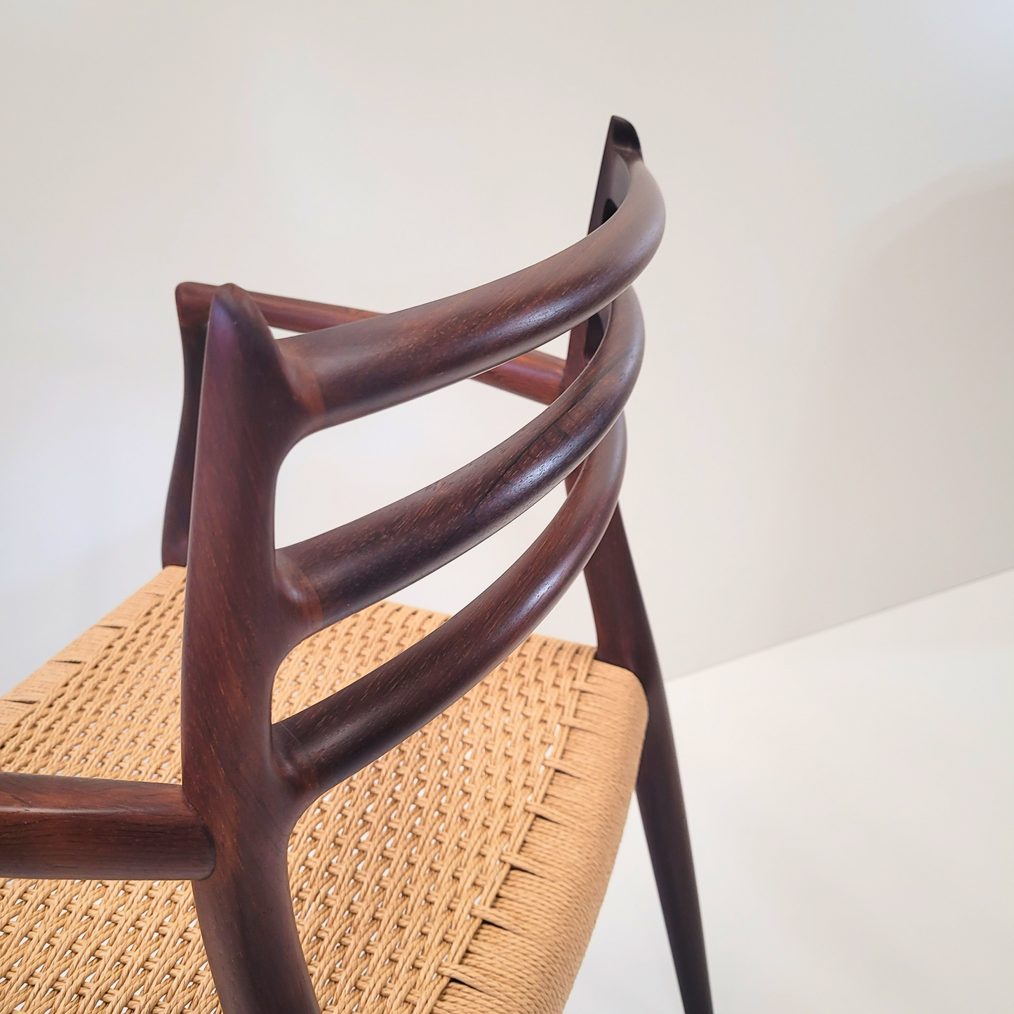 Niels Otto Møller #62 Rosewood carver dining chair