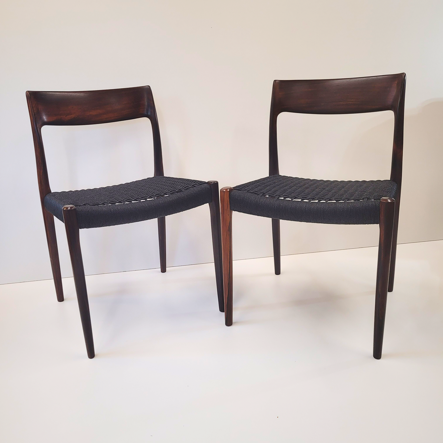 Niels Otto Møller #77 Rosewood dining chair black paper cord seat