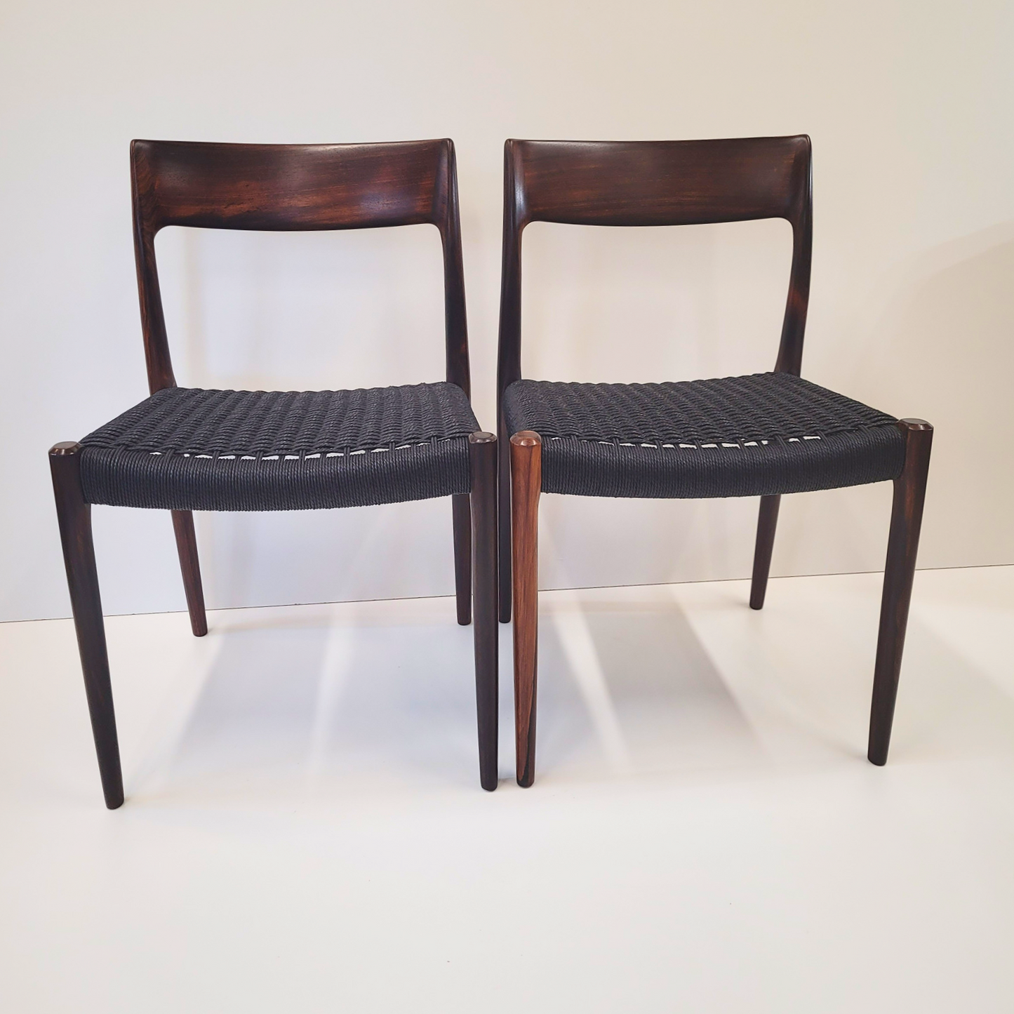 Niels Otto Møller #77 Rosewood dining chair black paper cord seat