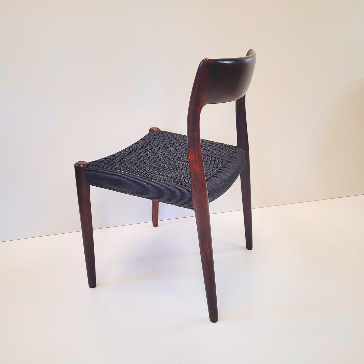 Niels Otto Møller #77 Rosewood dining chair black paper cord seat