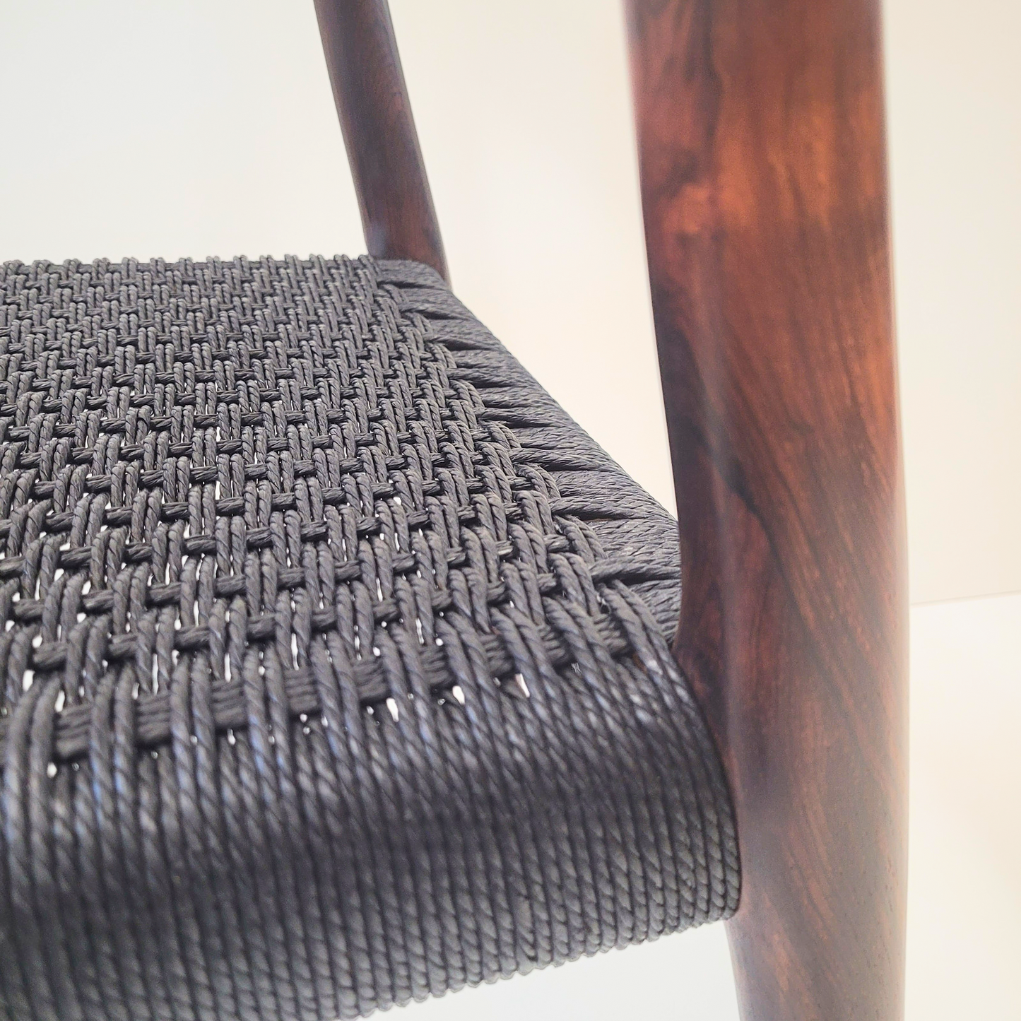 Niels Otto Møller #77 Rosewood dining chair black paper cord seat