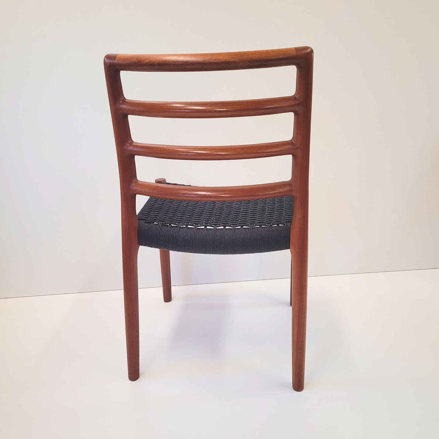 Set of 8 Niels Otto Møller #85 Teak chairs black paper cord seat